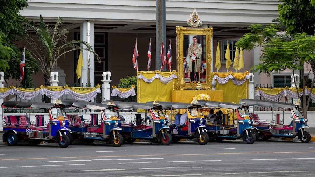 Electric vehicles on display at Bangkok International Motor Show with crowds viewing the latest EV models